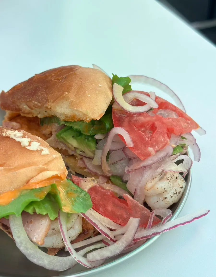 Cross-section of the cut Grilled Shrimp Avocado Burger