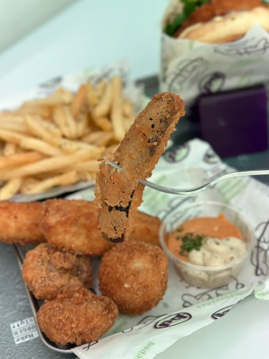 Close-up of the thin-battered eggplant fritter