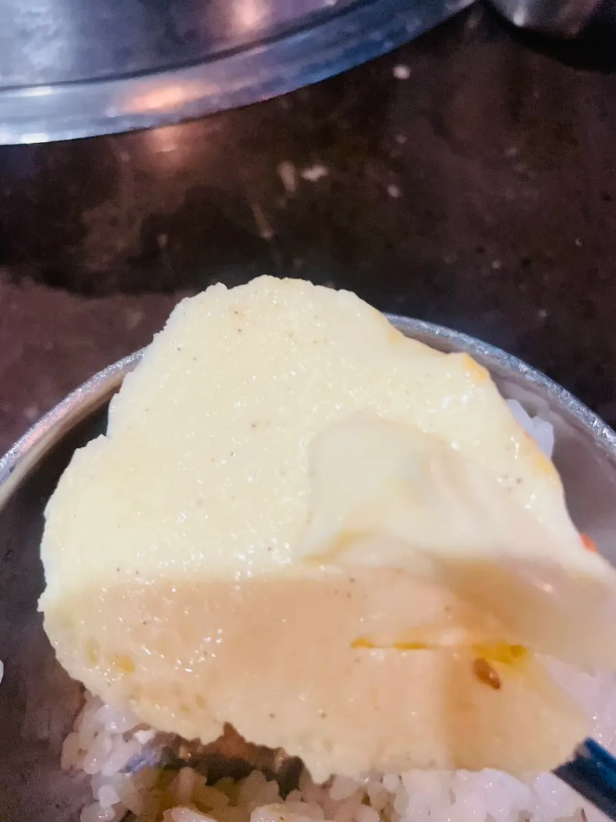 Steamed egg topped with sesame oil