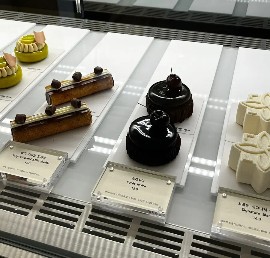 Slices of cake displayed in the showcase