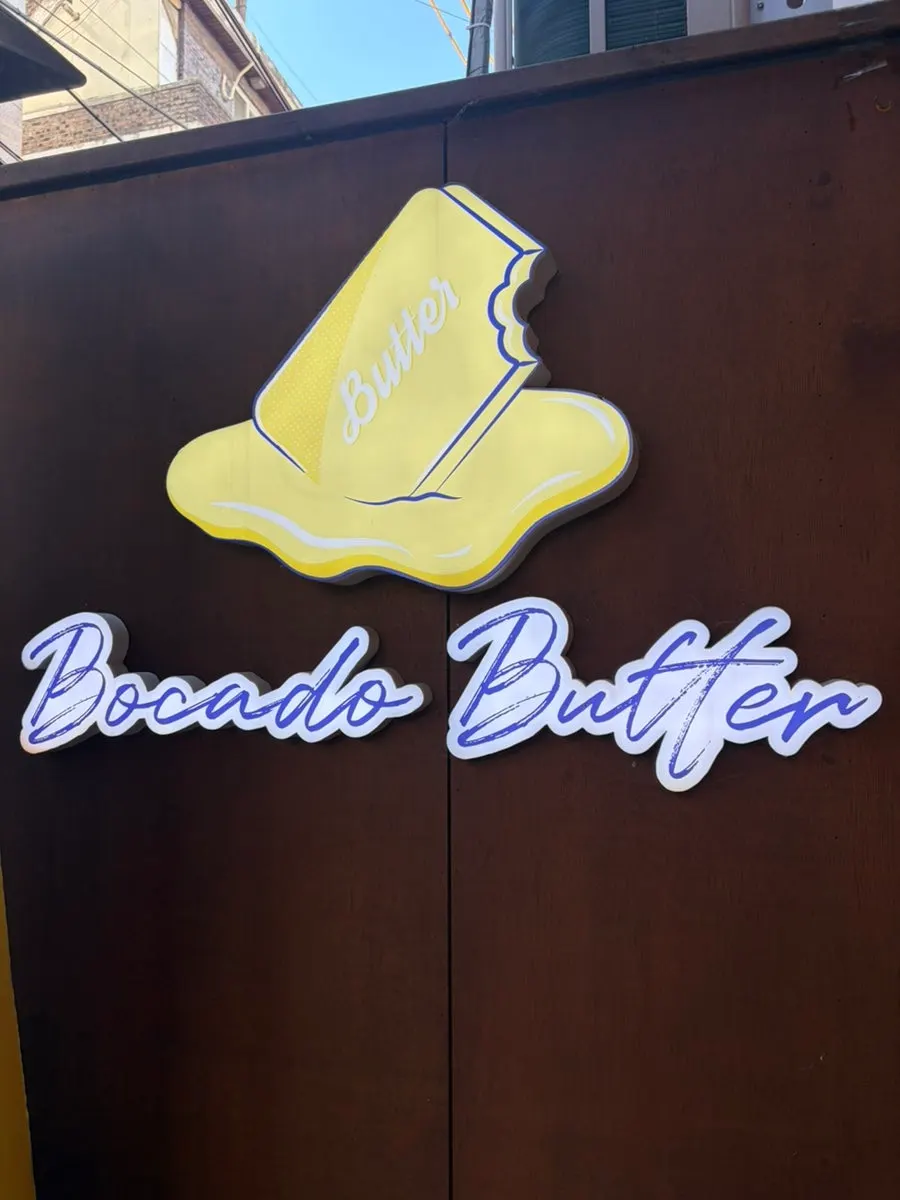 Outdoor benches packed with customers at Bocado Butter