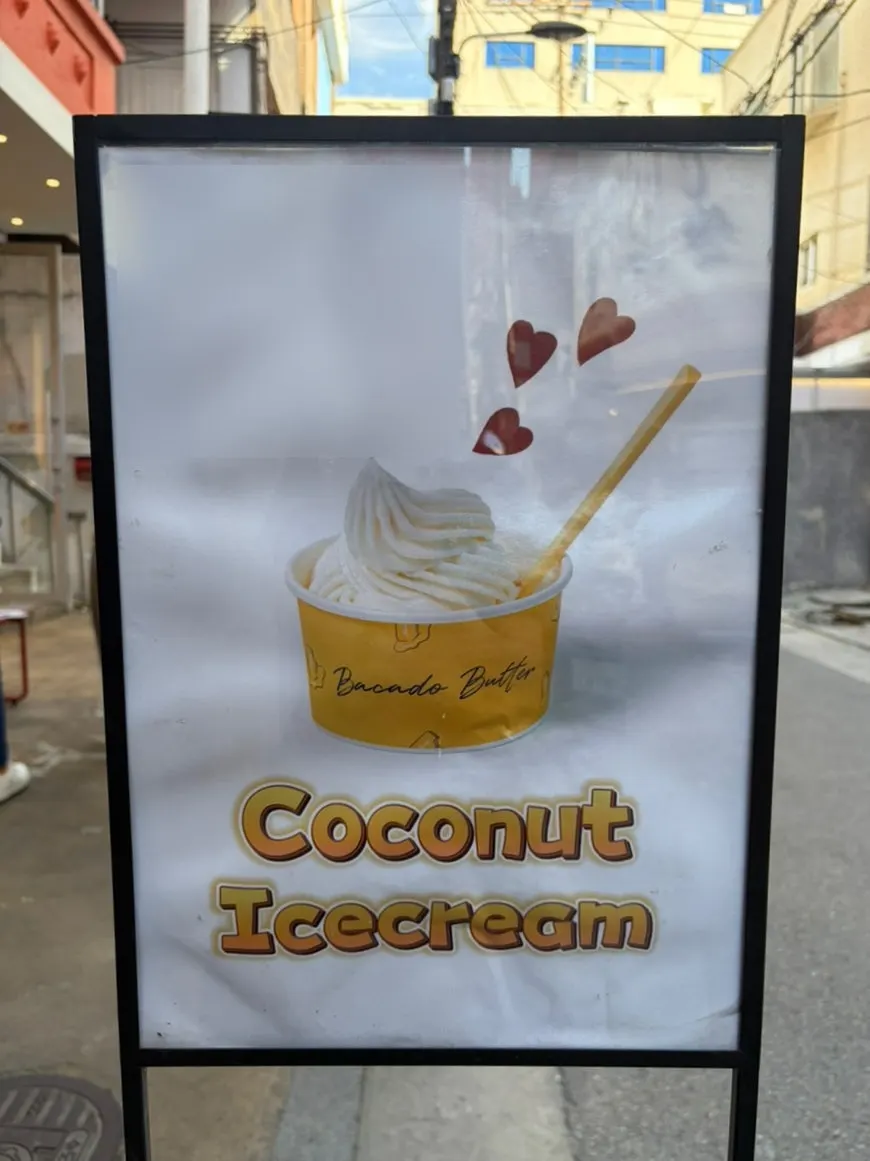 Menu sign outside Bocado Butter