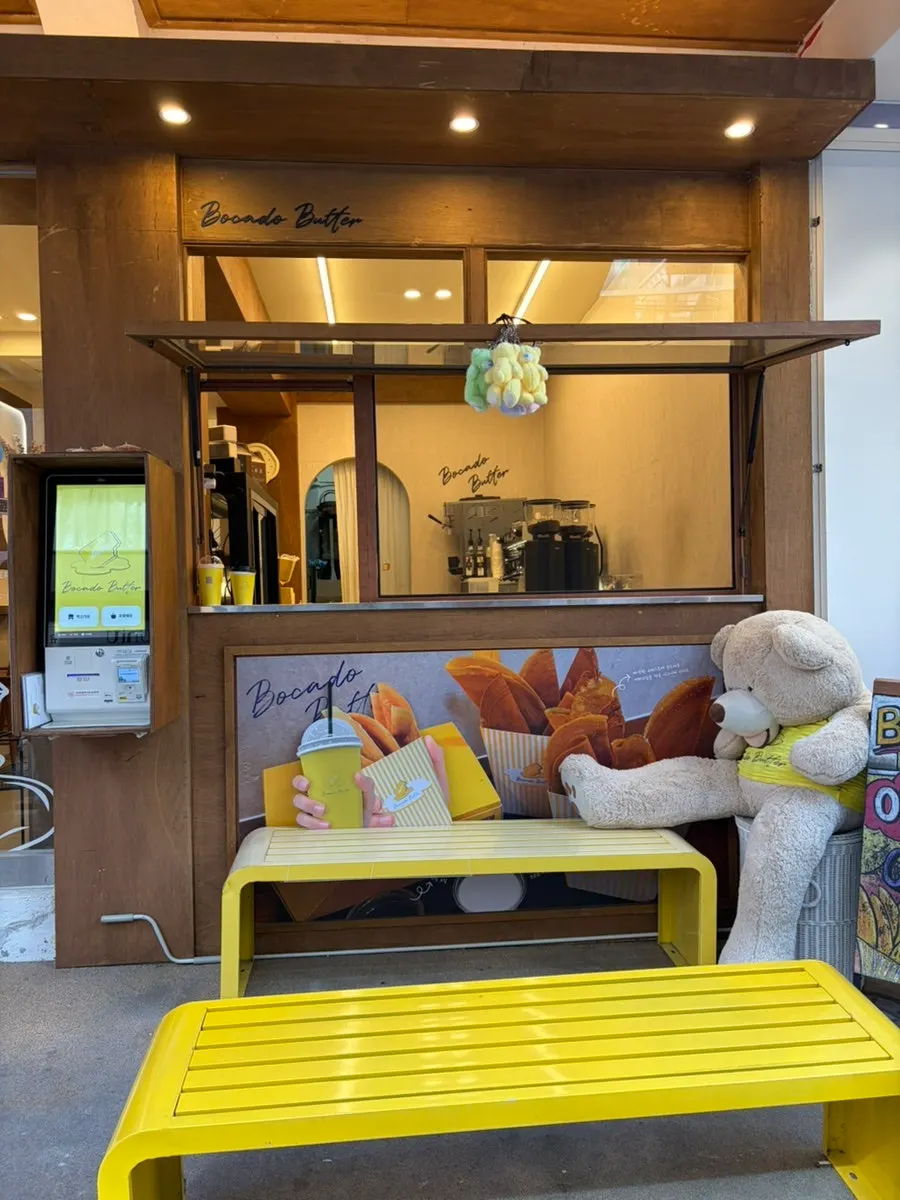 Sign for Bocado Butter's SNS check-in event and coconut ice cream