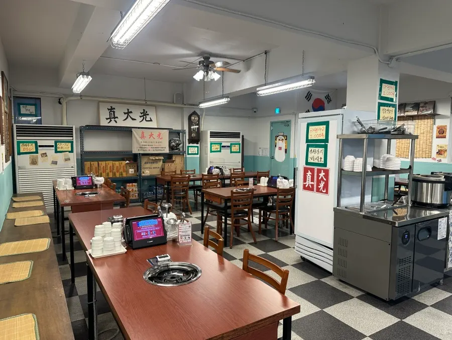 The spacious, open dining hall with generously spaced tables