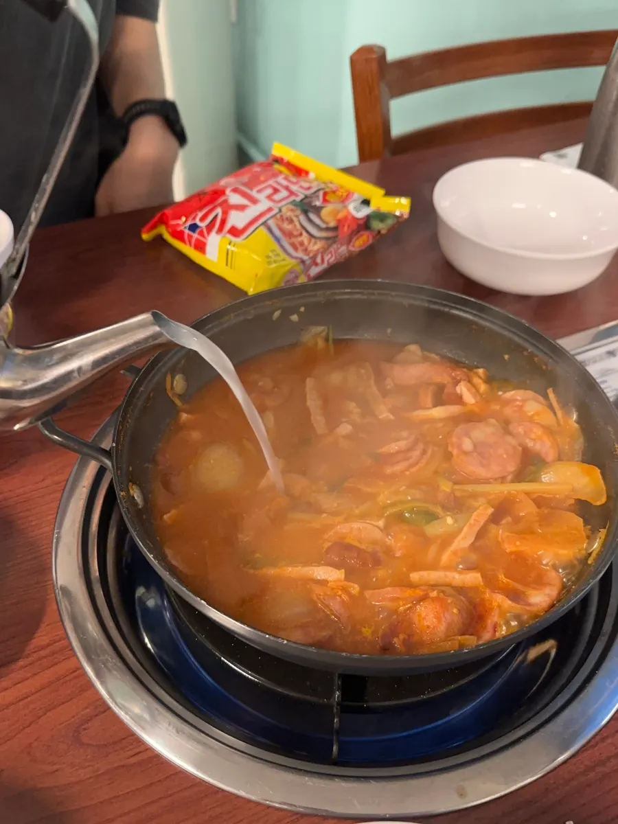 A bowl of the assorted sausages scooped out