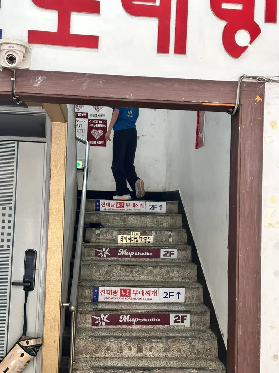 Staircase entrance leading up to the 2nd floor restaurant