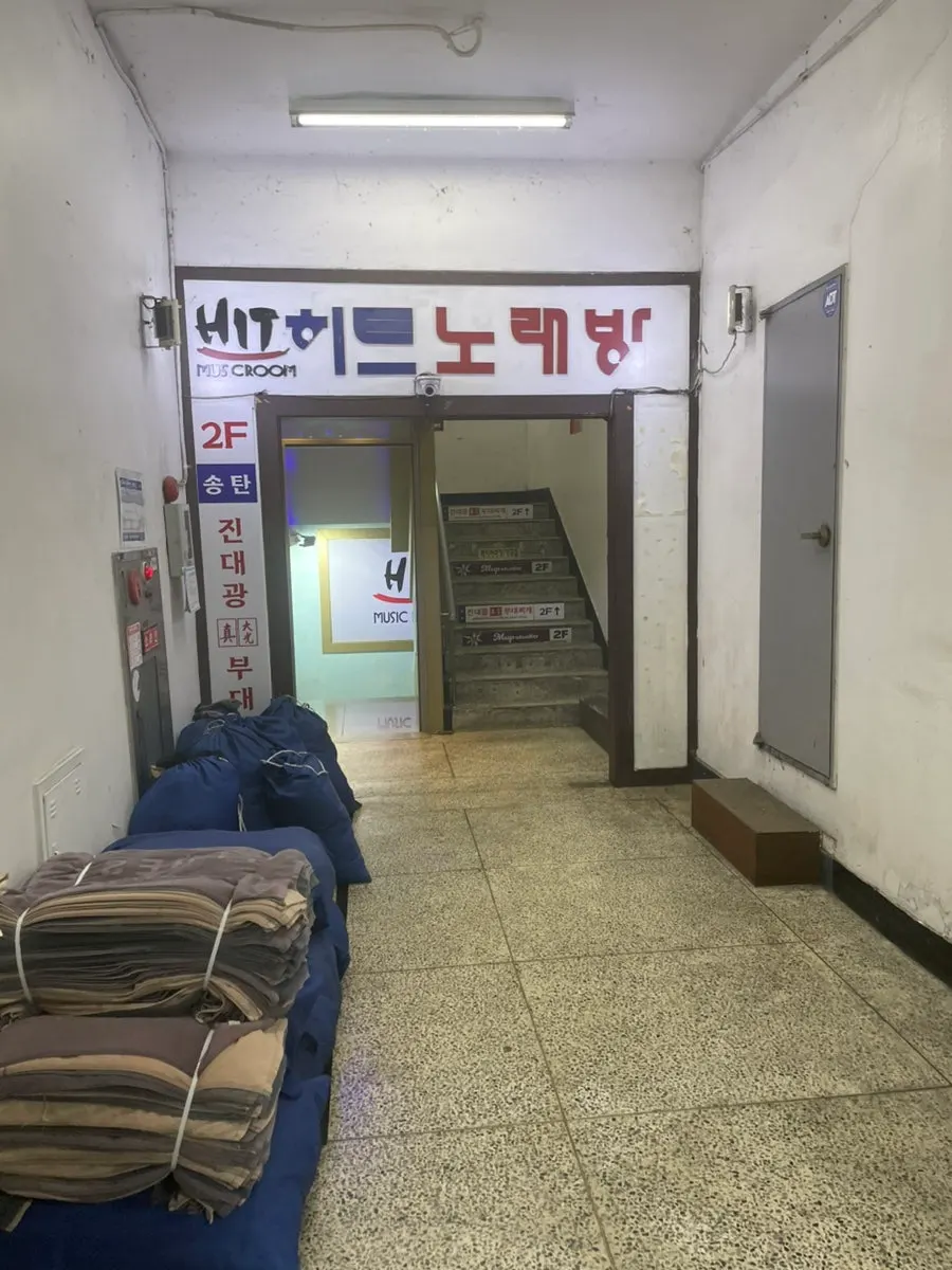 Exterior of the building housing Songtan Jindaegwang Budae Jjigae near Exit 1 of Seongsu Station