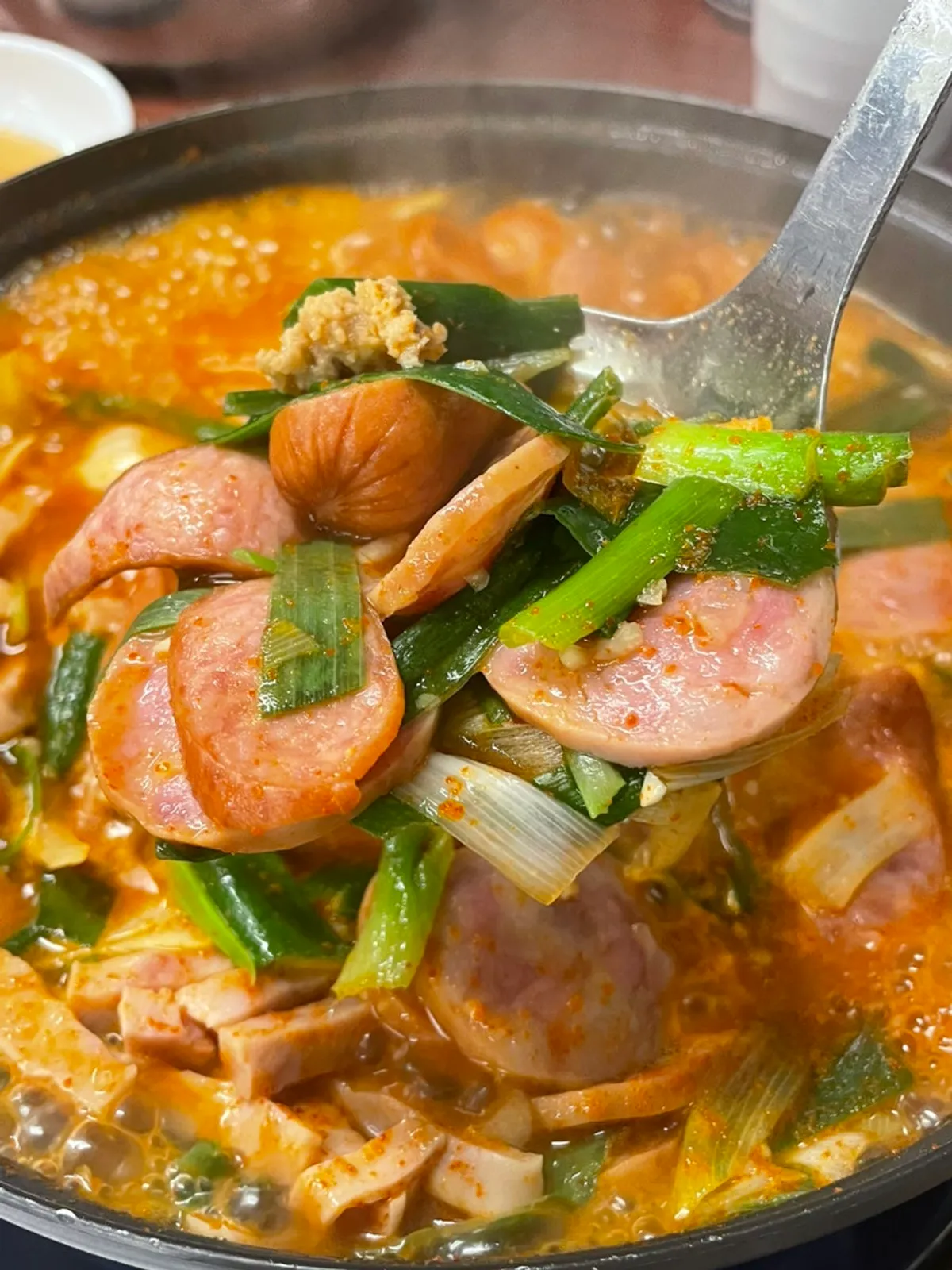Jindaegwang Budae Jjigae for two loaded with various sausages
