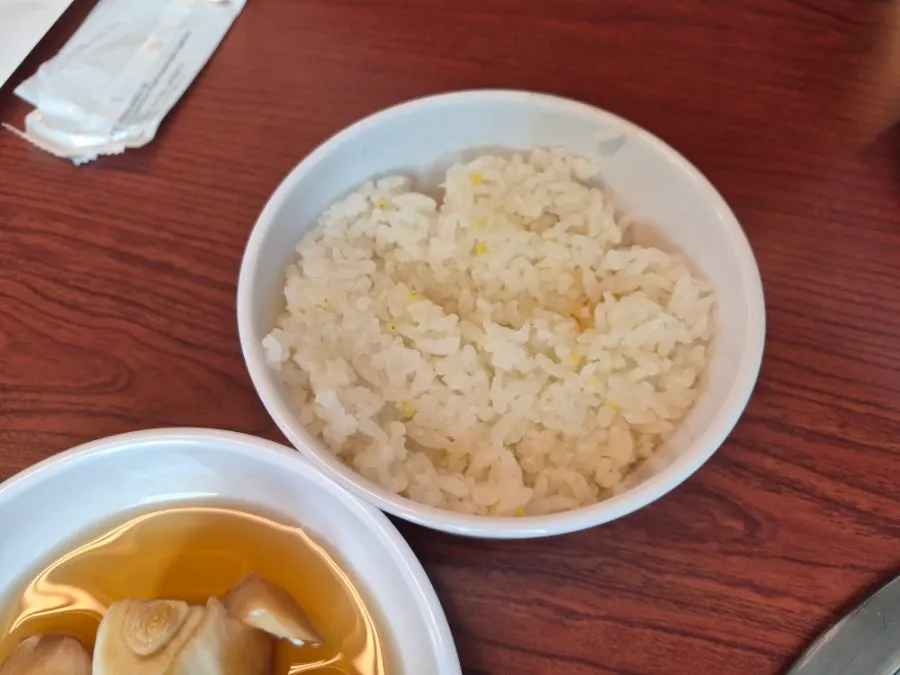 Side dish spread served with the budae jjigae