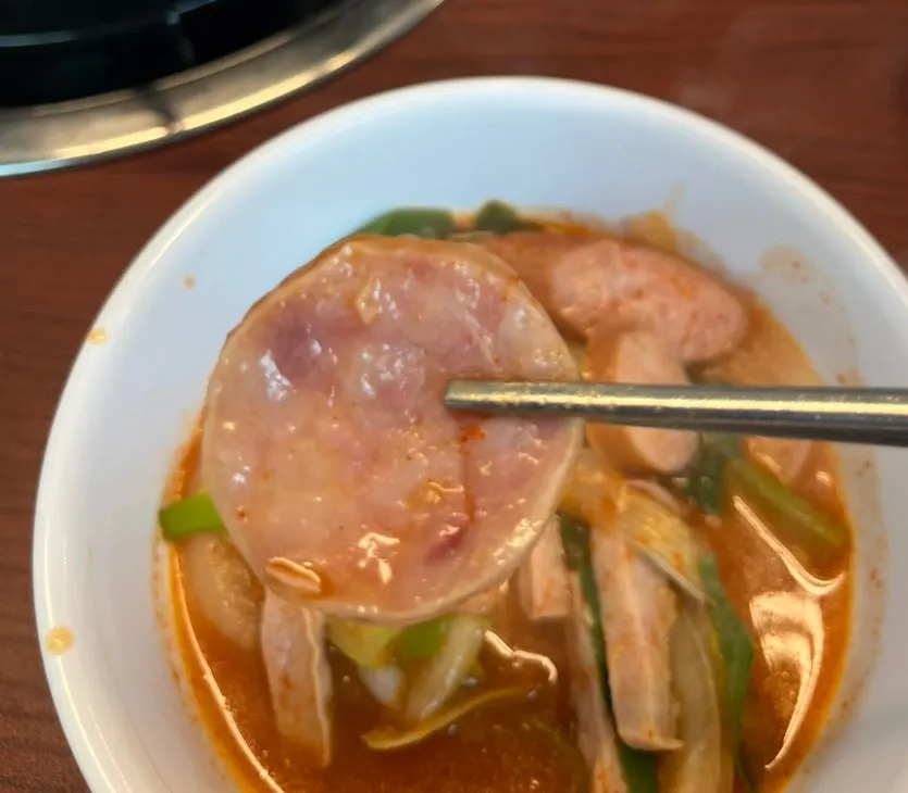 Long-cut Spam slices in the stew
