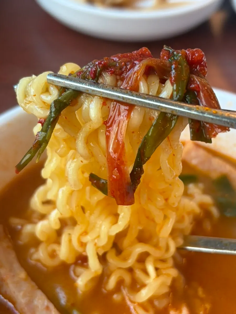 Ramen noodles cooked in the broth