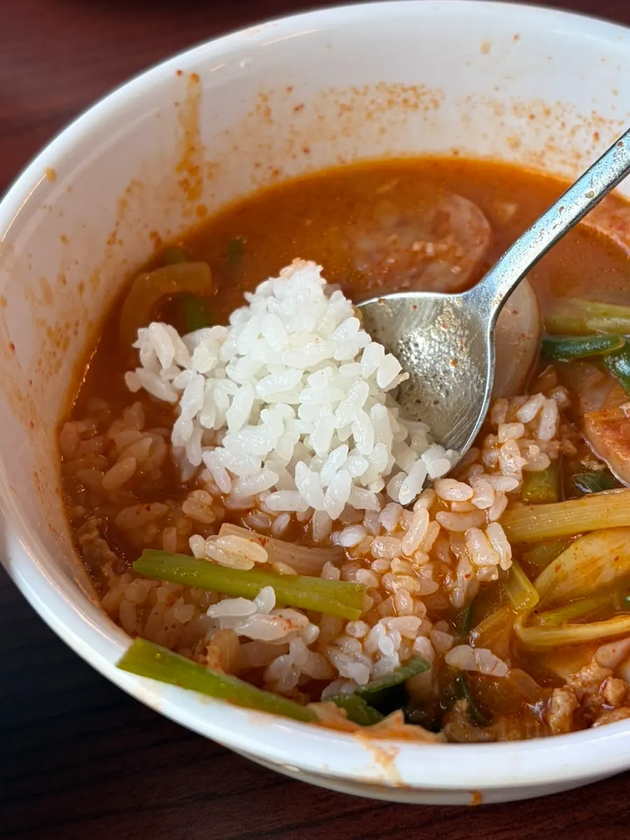 Budae jjigae ramen served with scallion kimchi