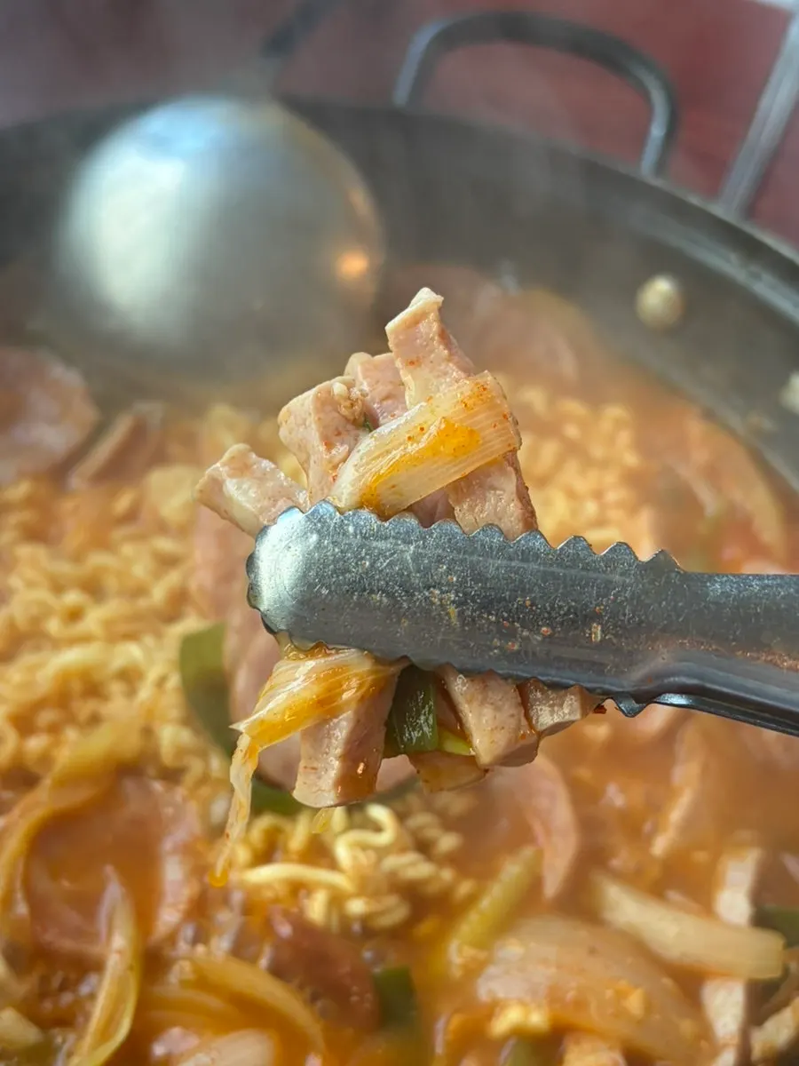 A meal of budae jjigae served with rice