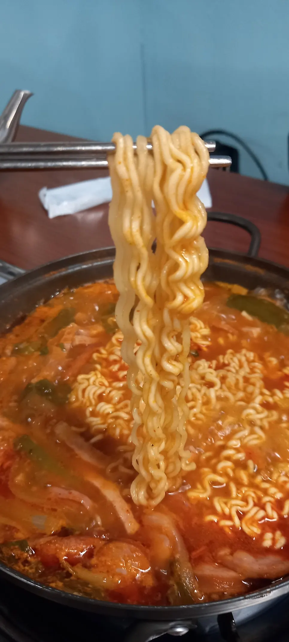 Budae jjigae pot with ramen noodles added