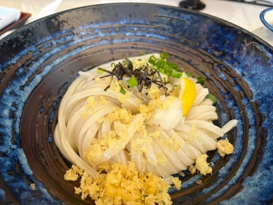 The bukkake sauce and toppings served separately