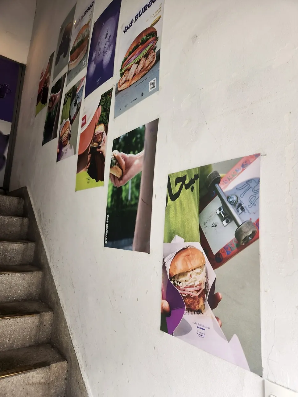 bd BURGER sign and stairway entrance