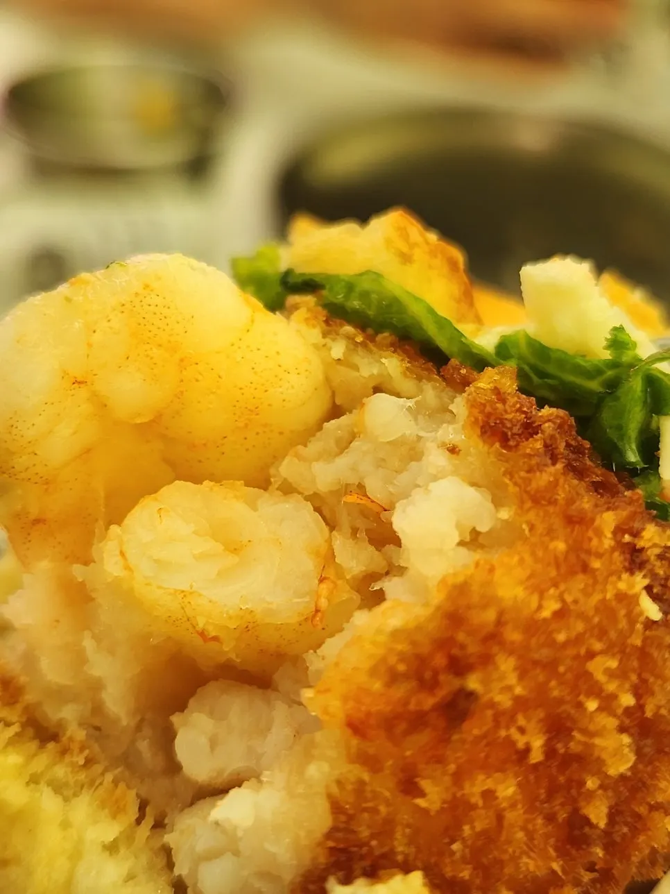 Cross-section of a shrimp patty filled with whole shrimp