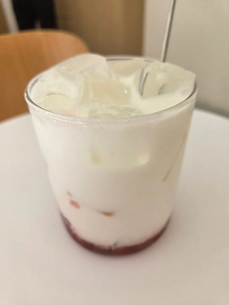 Strawberry latte with house-made strawberry syrup enjoyed in the café