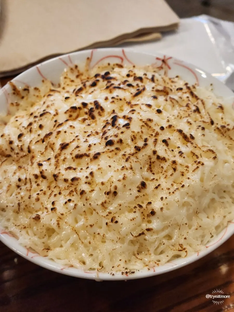 Cheese risotto rice added to ramen broth