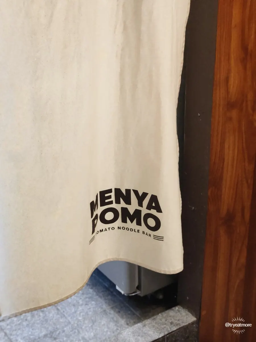 Menya Pomo tomato noodle bar sign