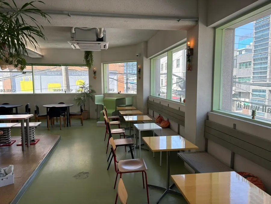 Spacious interior of the Childish second-floor café