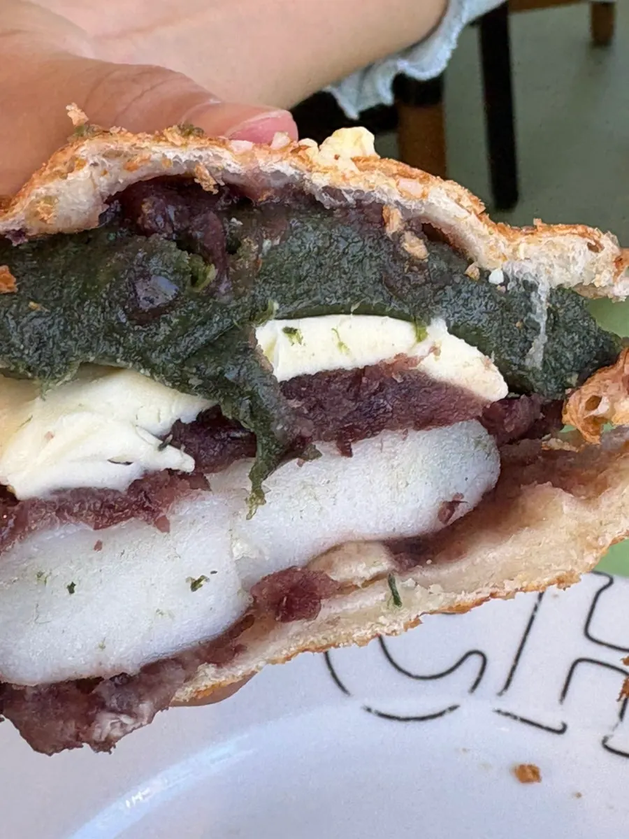 Cross-section showing rice cake and red bean inside the salted taiyaki