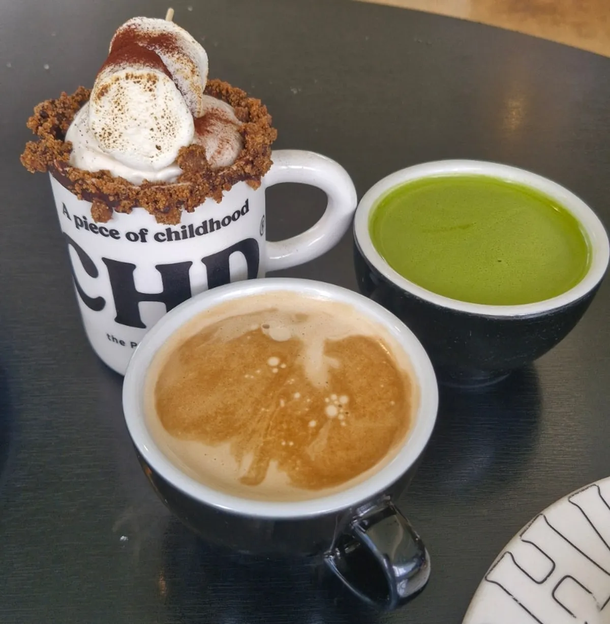 Fireplay Cream Latte topped with marshmallow and cream
