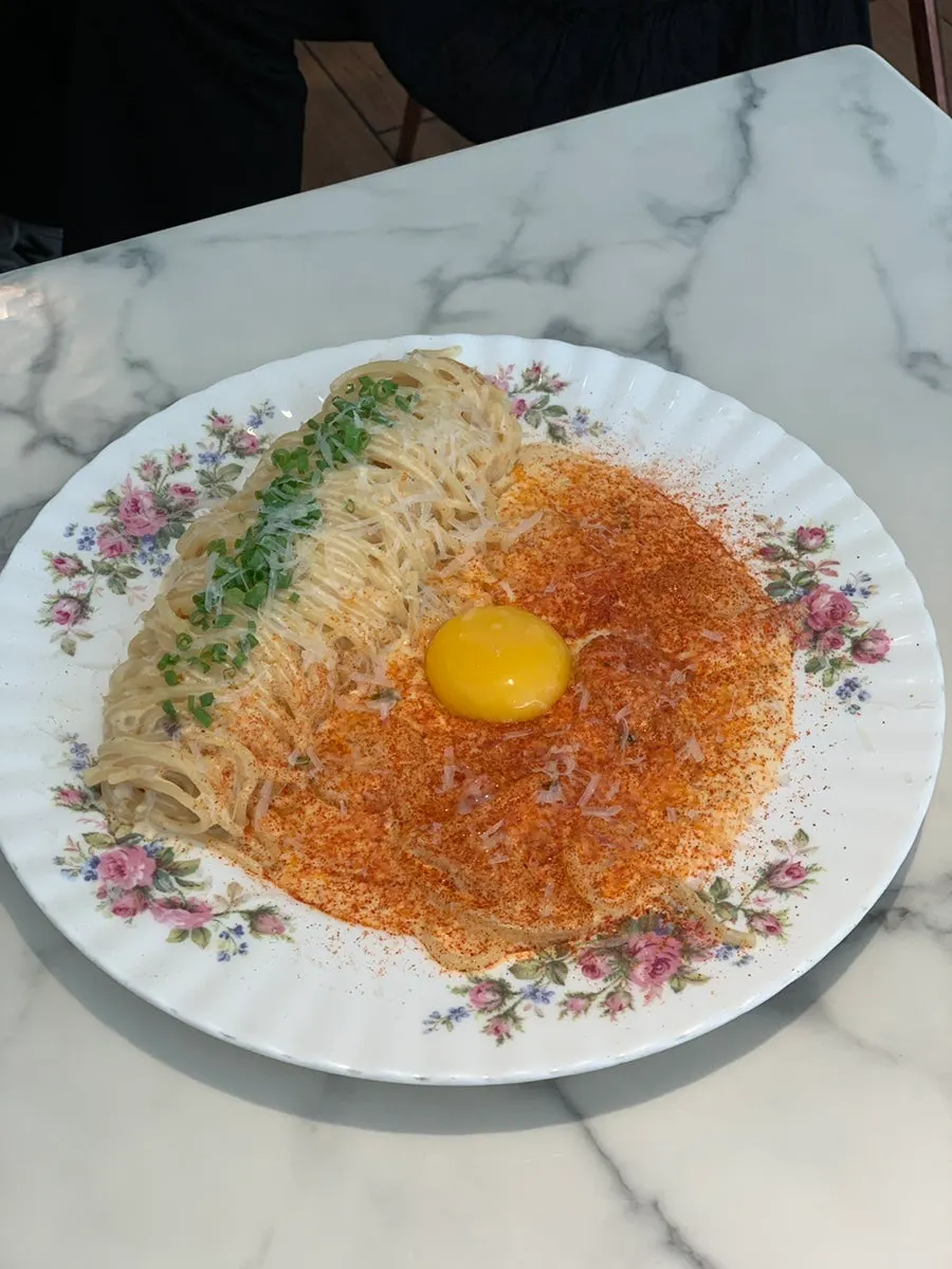 Noodles coated in thick cream sauce