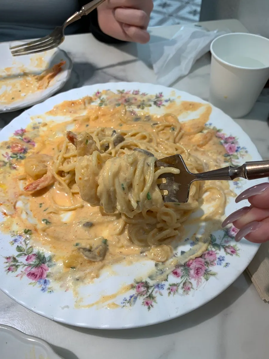 Close-up of shrimp in the spicy cream pasta