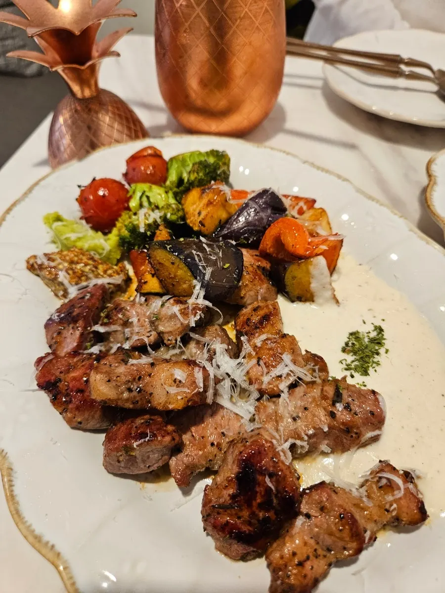 Plate of chapmoksal steak with mashed potatoes