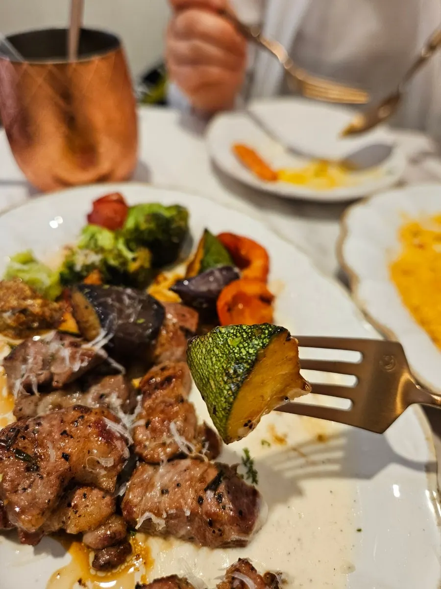 Pork neck steak served with wasabi and whole grain mustard