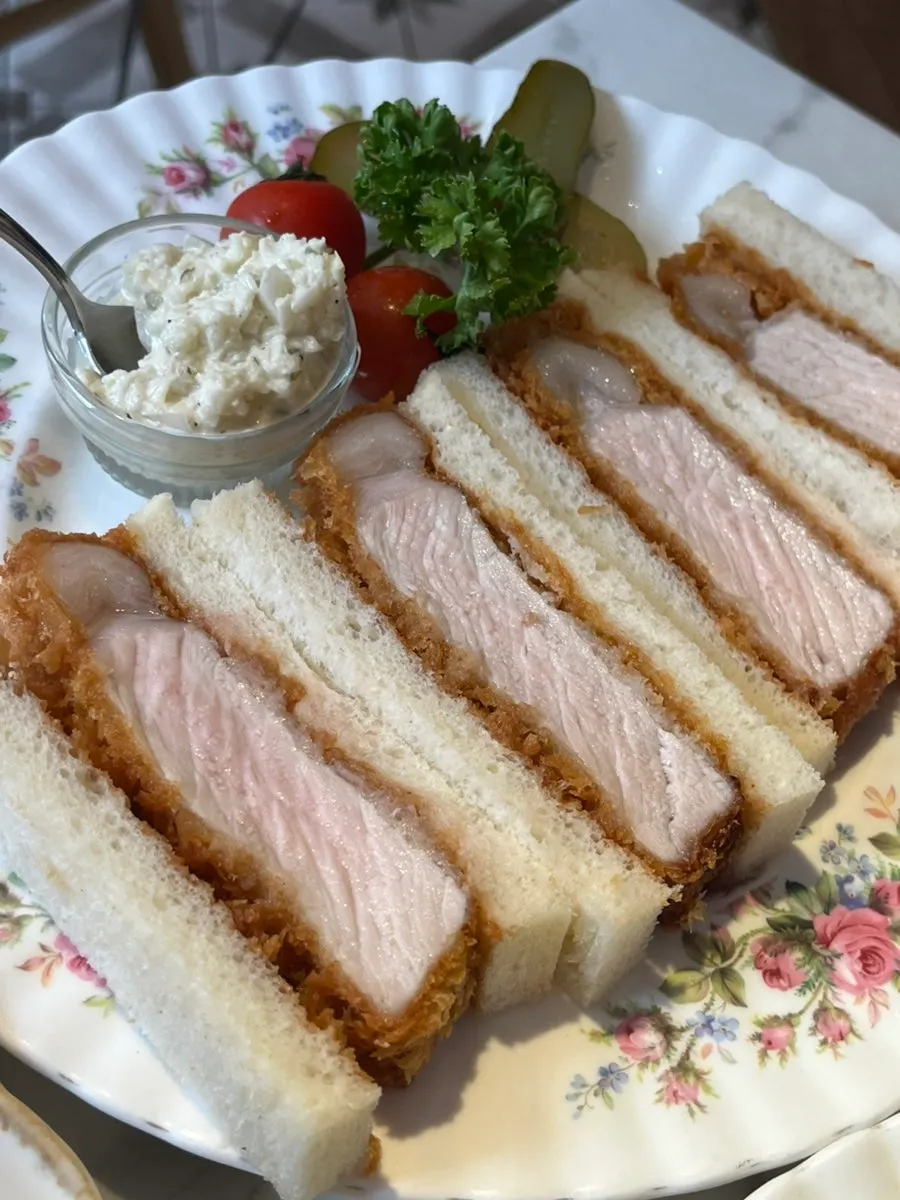 Crispy pork cutlet paired with coleslaw