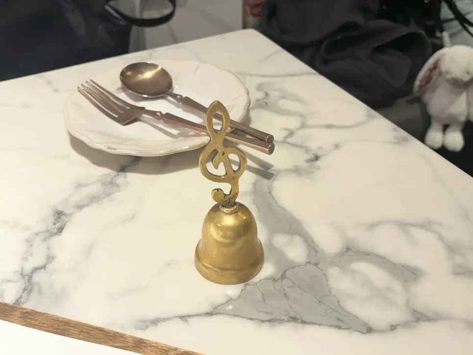 The call bell on a table at Seongsu Darak