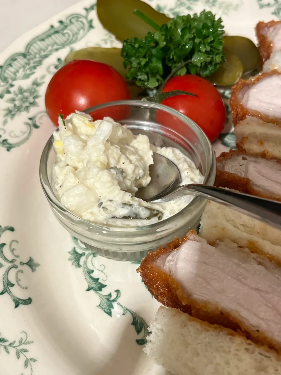 Cross-section of the katsu sando showing the thick pork cutlet