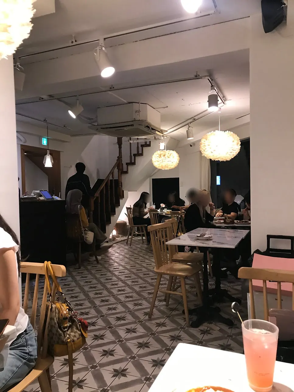 Two-seat table on the 2nd floor of Seongsu Darak with floor-to-ceiling windows