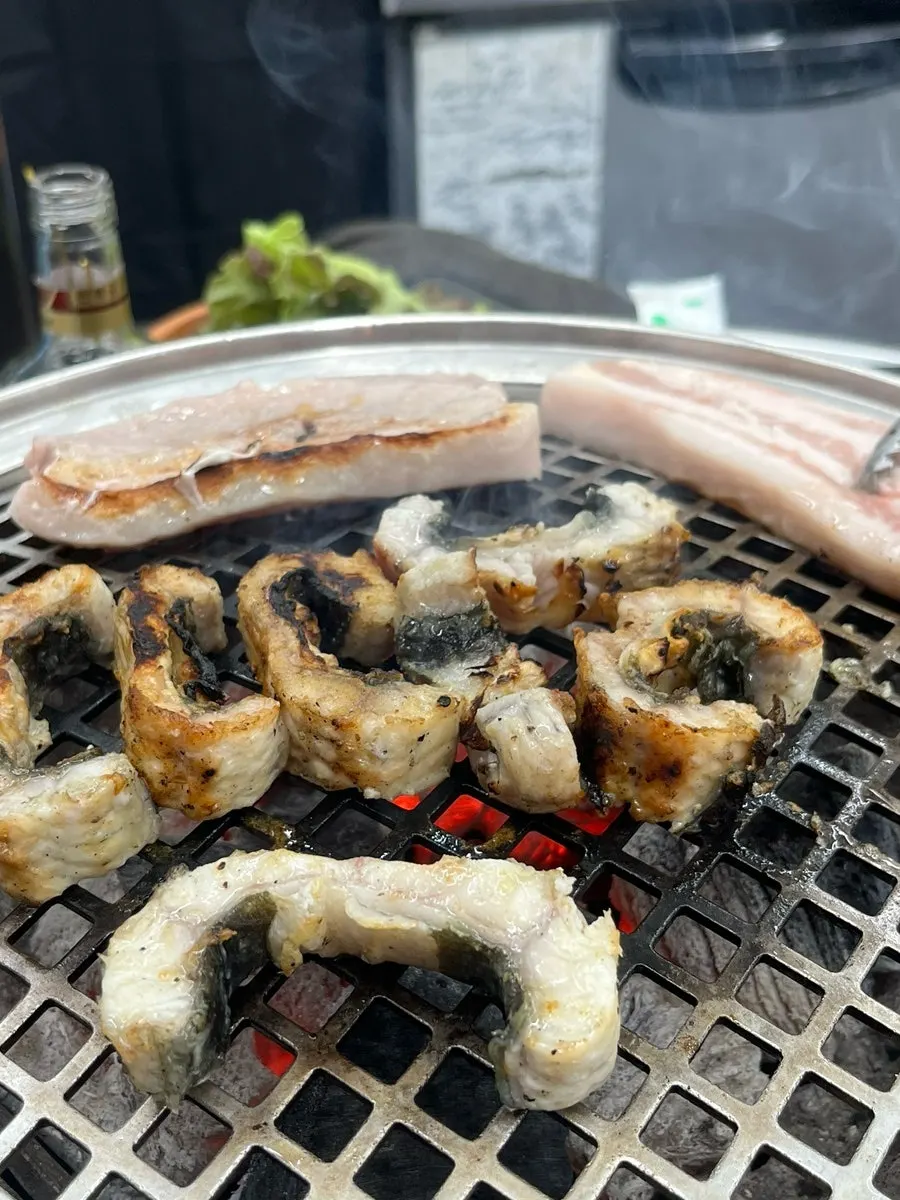 Eel tail and bokbunja wine on the table