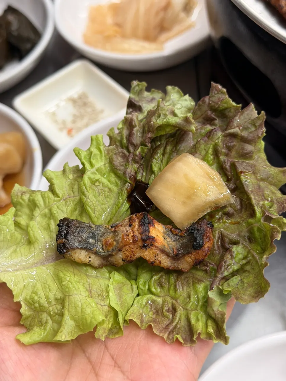 Self-serve bar with lettuce and meat available for refills
