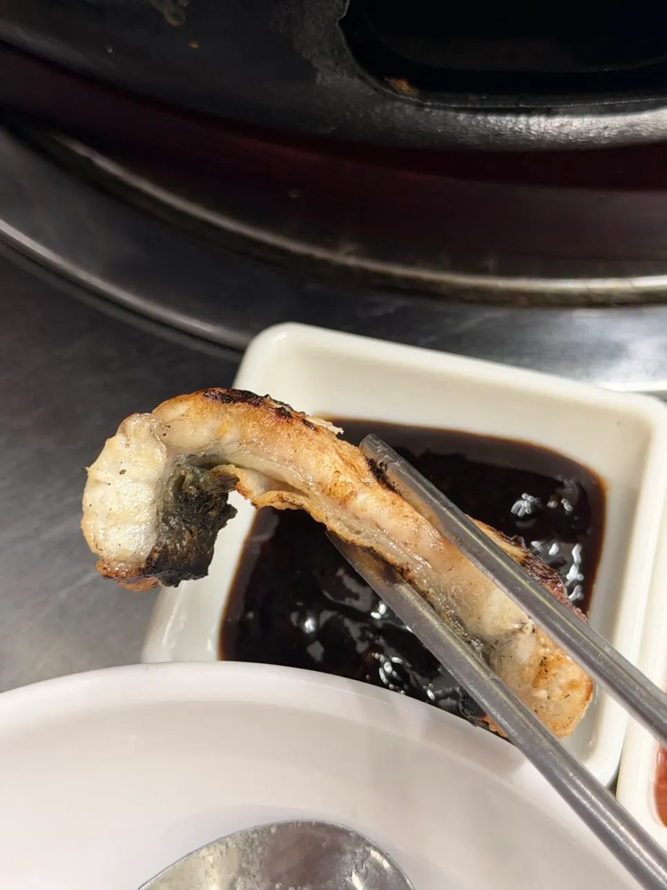 Freshwater eel grilling skin-side first
