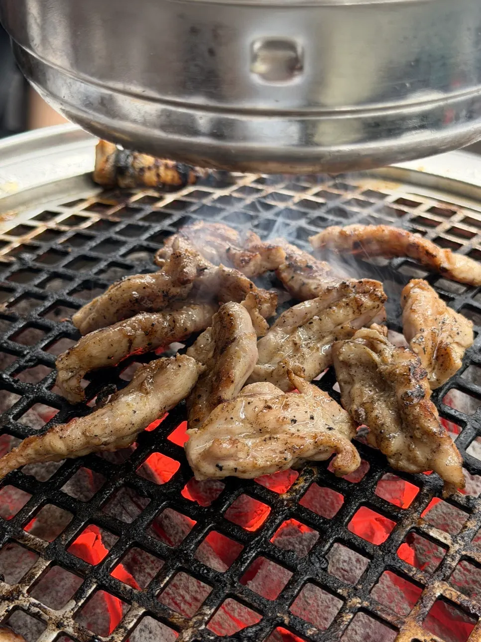 Crispy grilled pork belly and chicken thigh
