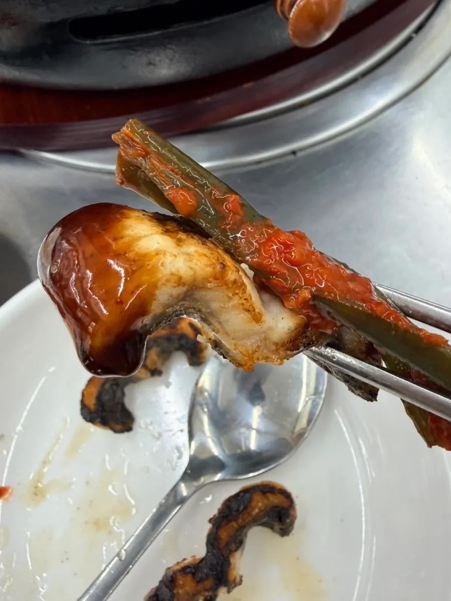 Close-up of crispy-outside, tender-inside grilled eel