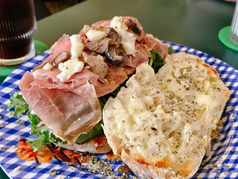 Cross-section of melted mozzarella inside ciabatta