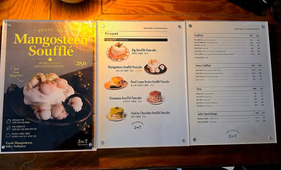 Menu order of fig soufflé and drinks