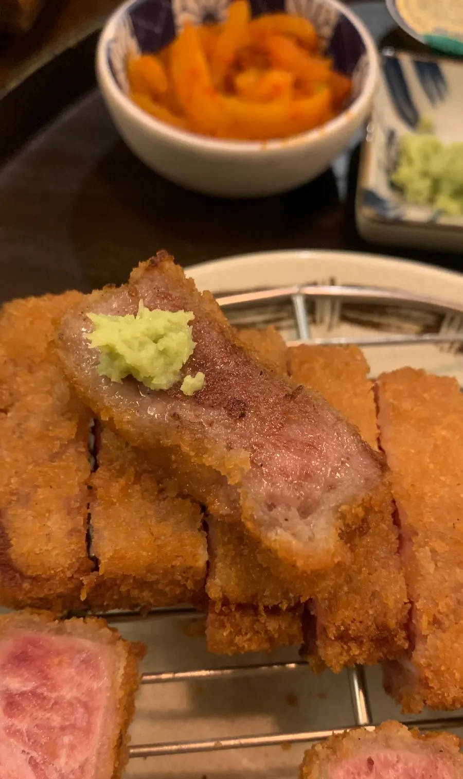 A cross-section of gyukatsu still red on the inside