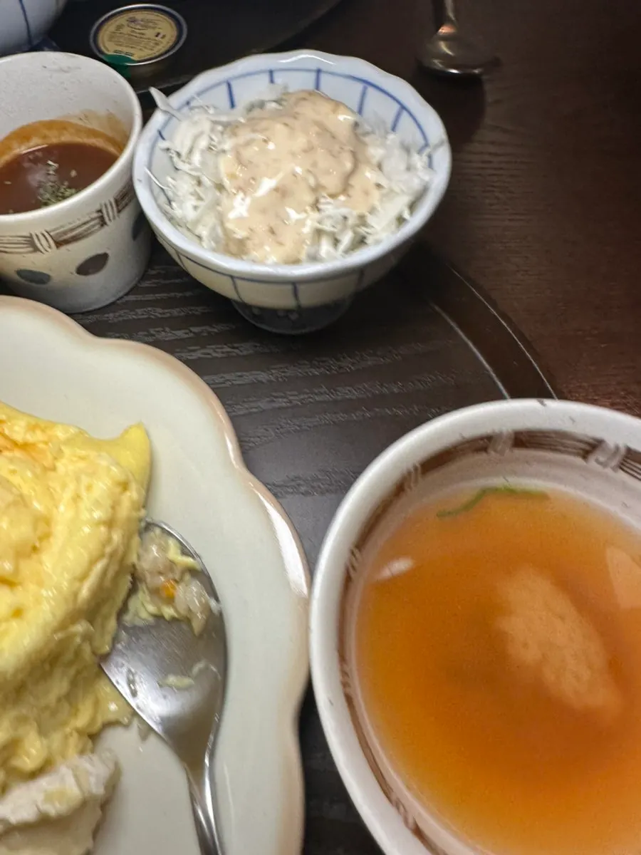 Full meal with clear soup and salad