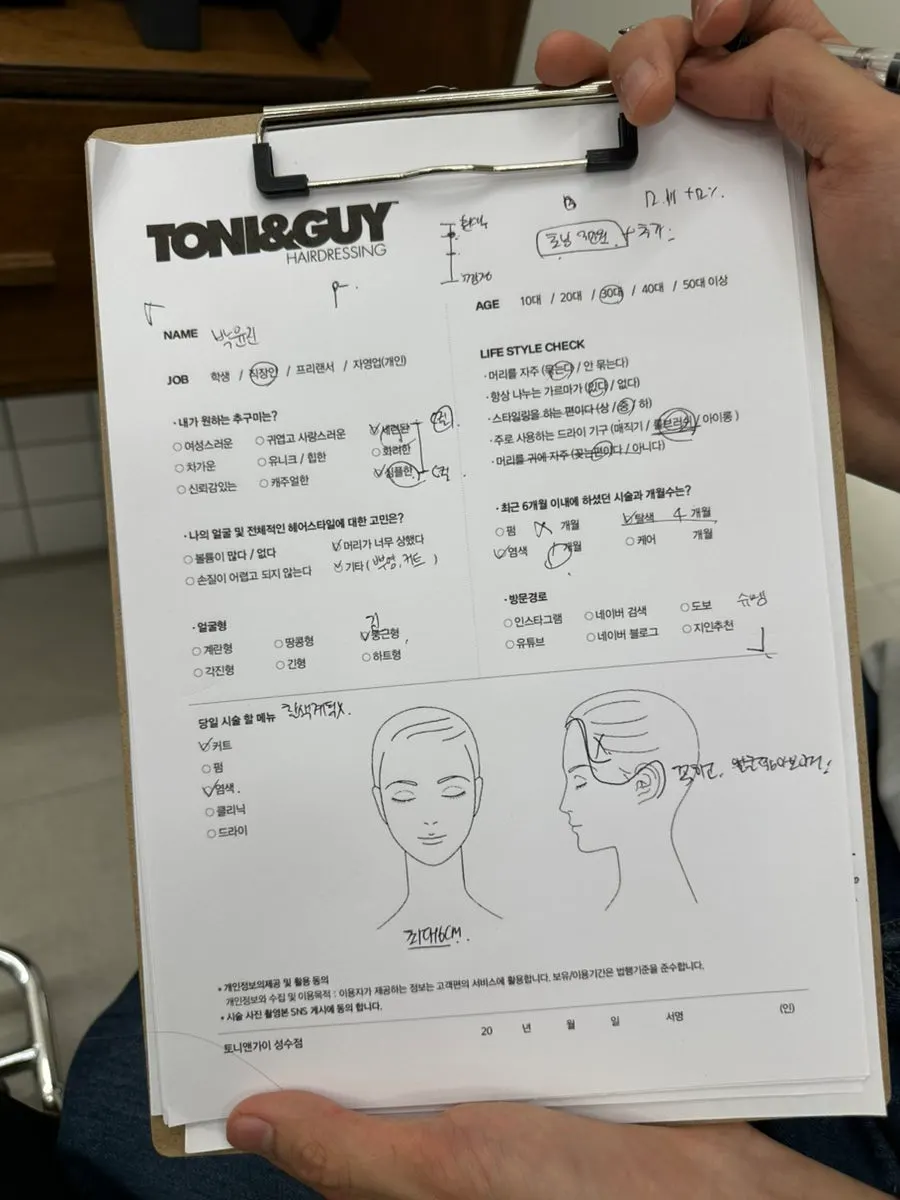 Getting a hair consultation at the styling seat