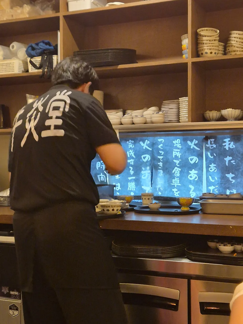 Seats near the food plating area