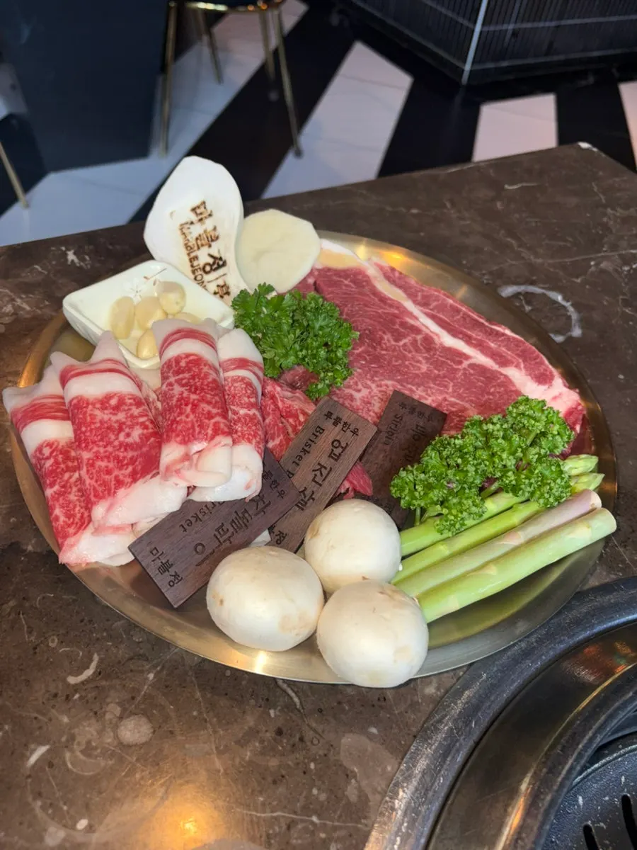 Premium Korean beef grilled by a Marblejeong staff member