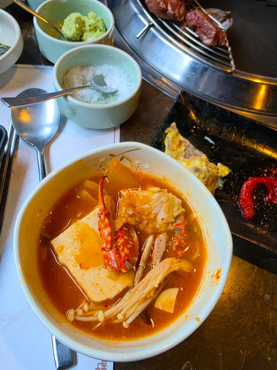 Two-Plus Korean beef brisket cooking on the grill