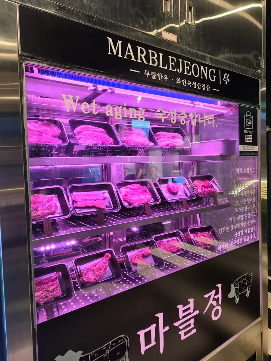 Wet-aging fridge for Two-Plus Korean beef on one side of the restaurant