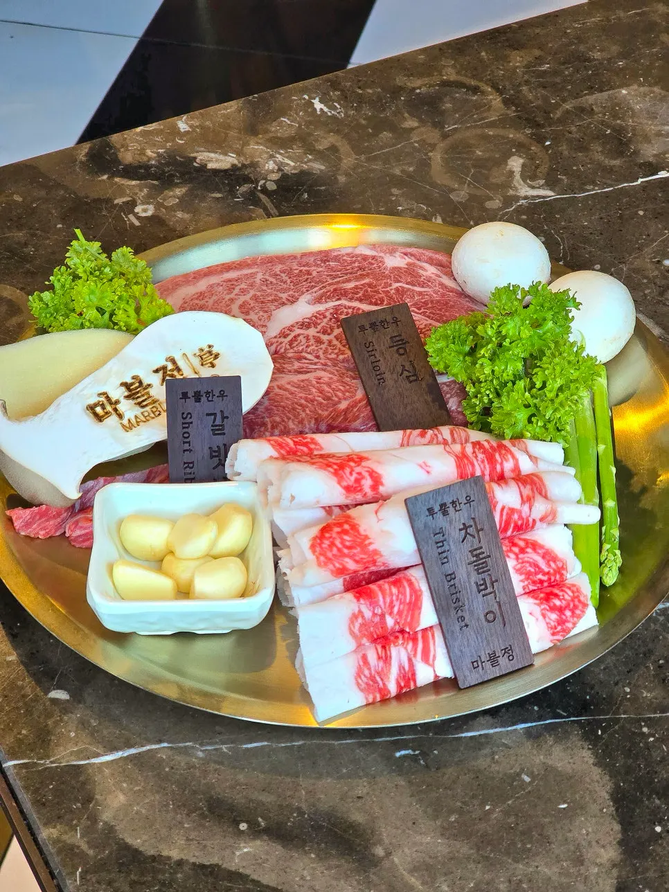 Basic side dishes including dongchimi, myeongyi namul, and green onion kimchi